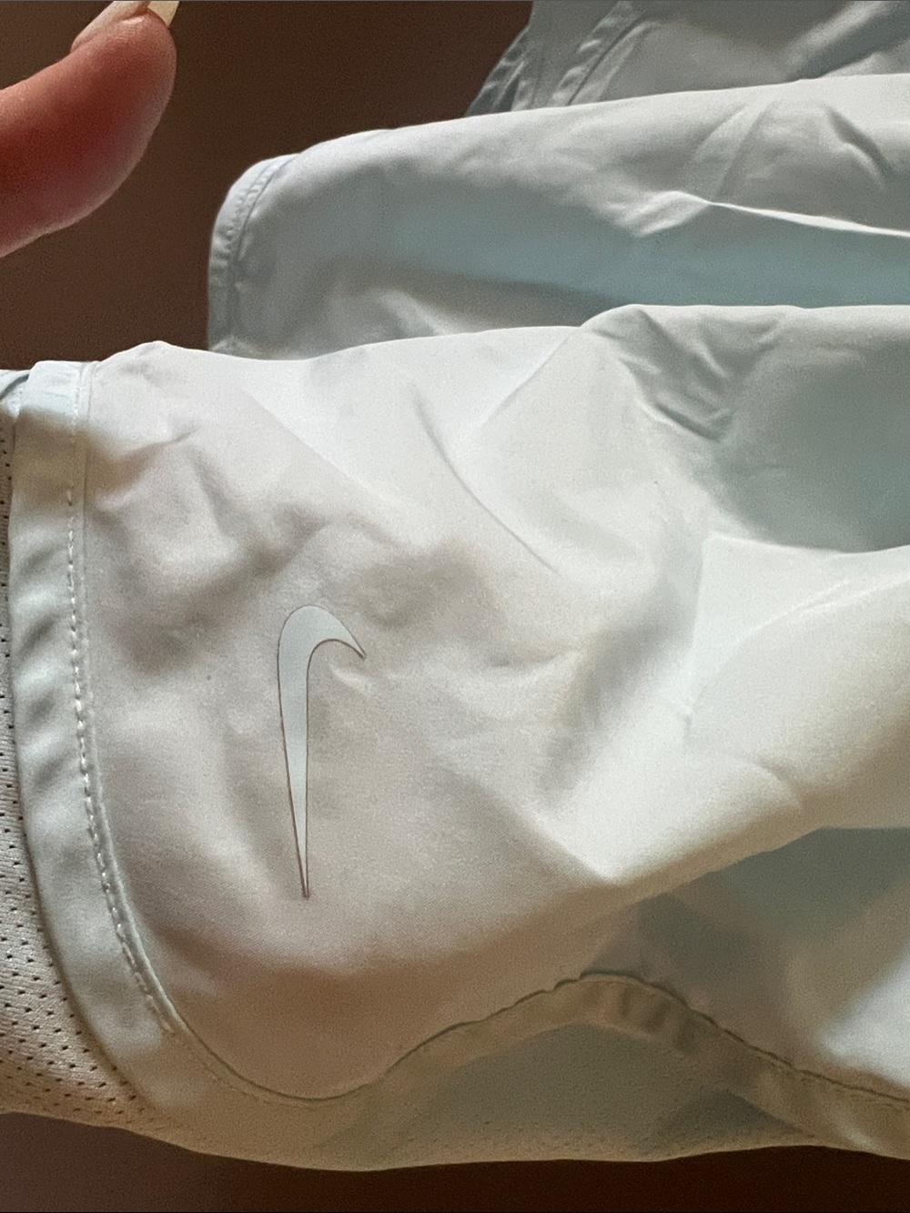 Nike Light blue athletic shorts with Swoosh